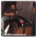 Adam Lang playing a mandolin with the band Hitchcocks Regret at the Live N Local August edition - whatsoncentralcoast image